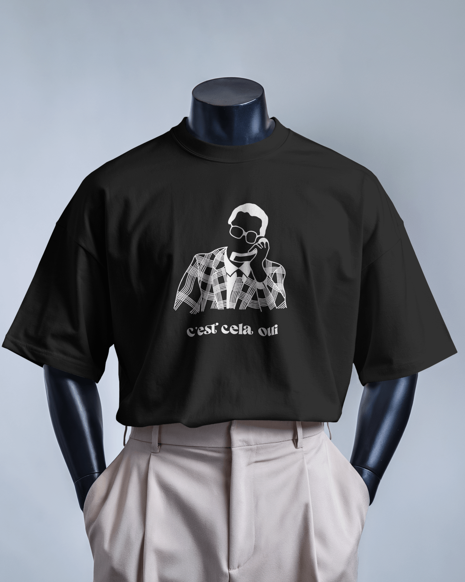 White MerciSidi T-shirt featuring "Le père Noël est une ordure" design in bold text.