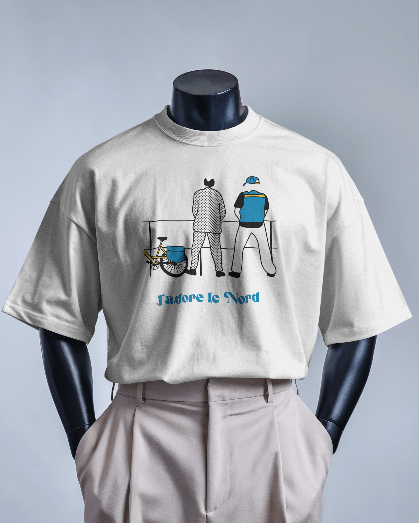 White MerciSidi T-shirt featuring "J'aime le Nord" and "Bienvenue chez les ch'tis" graphic design.