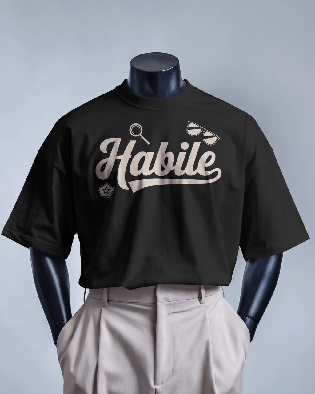 T-shirt noir MerciSidi Habile avec motif OSS 117, en coton, style décontracté et moderne.